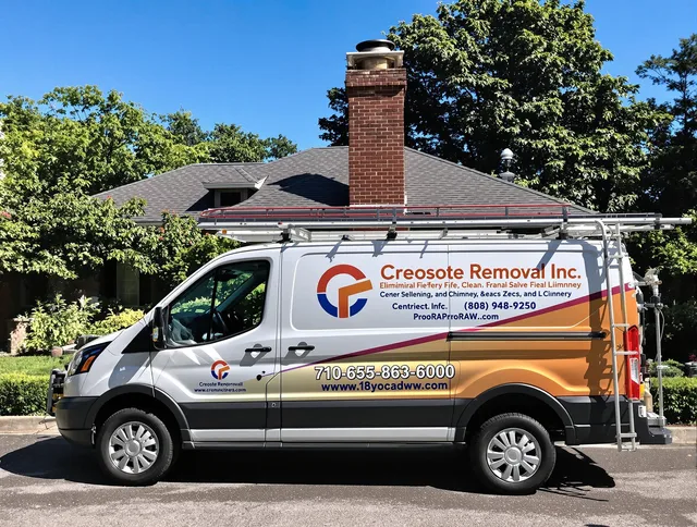 Redlands Chimney Sweep technician removing creosote safely in Redlands, CA