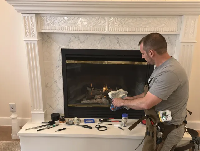 Redlands Chimney Sweep performing fireplace maintenance in Redlands, CA